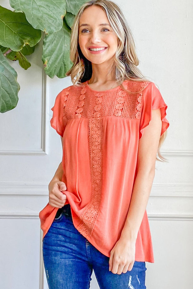 Ruffle sleeve blouse with lace detail chic and feminine