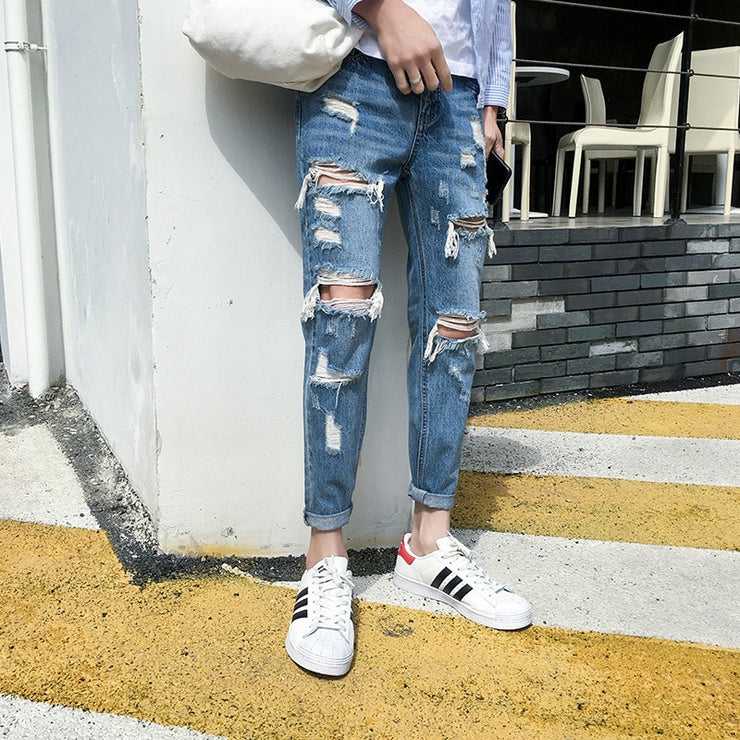 Top quality 2020 Distressed beggar jeans male giant ripped hole handsome male feet hip hop streetweat cowboy harem pants men